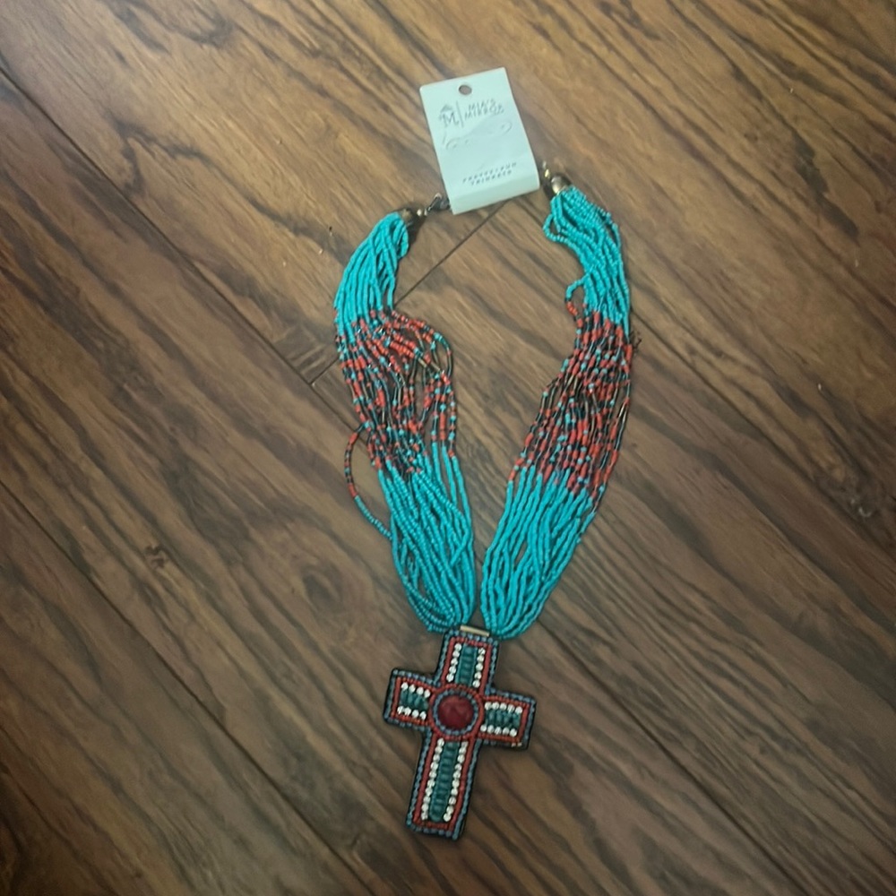 Mia’s Mirror cross necklace